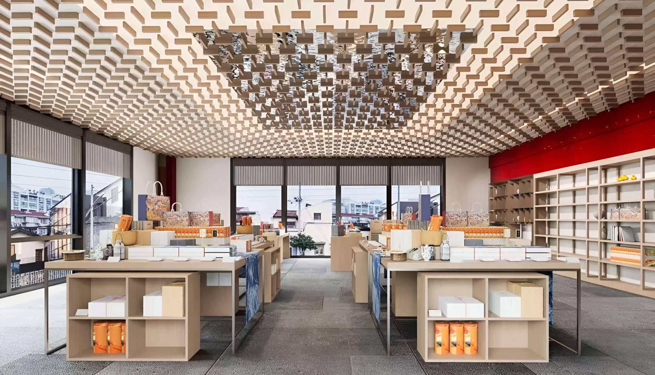 Timber display tables and wall shelving beneath a sculptural ceiling