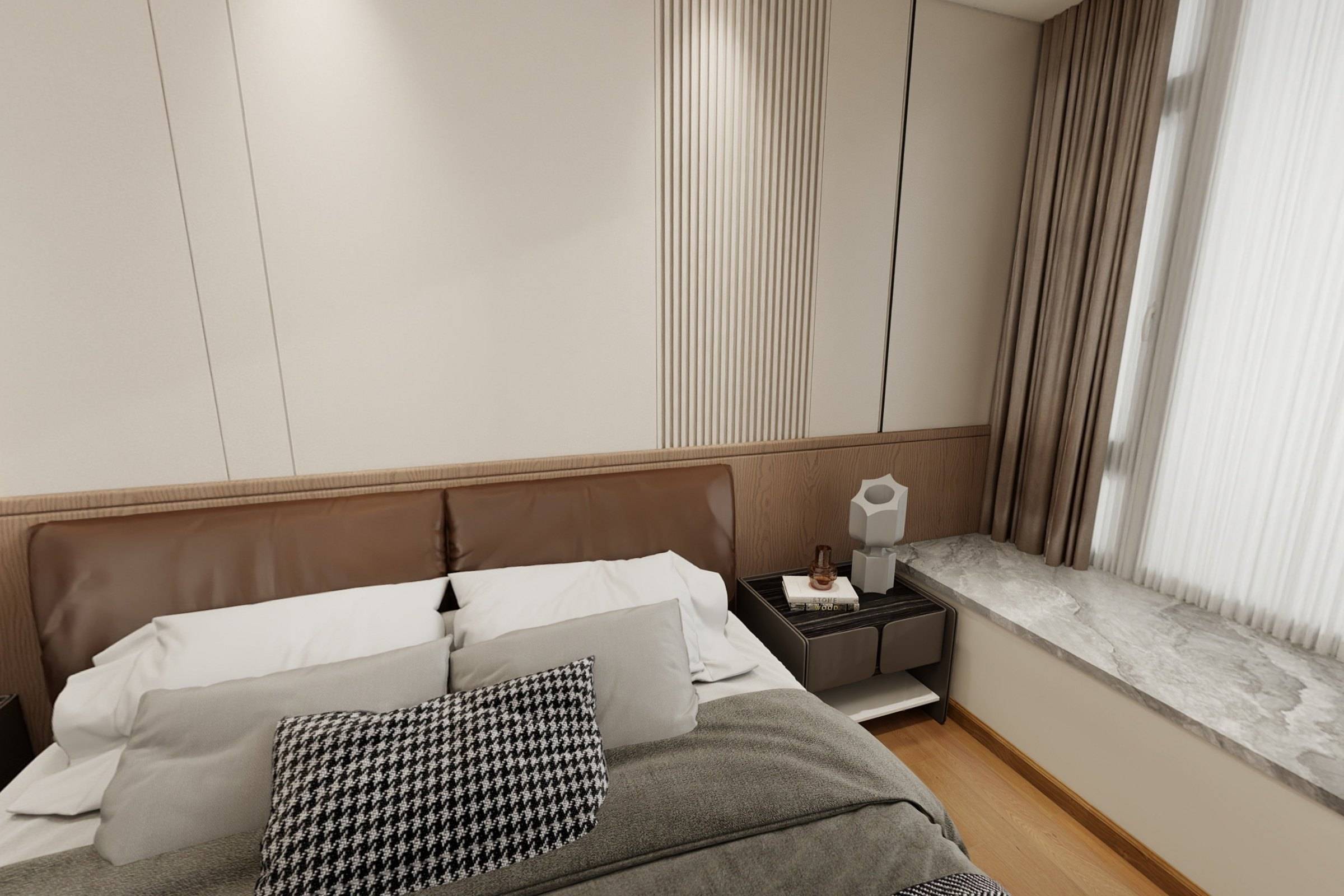 Bedroom with a leather headboard, timber wainscot and a stone window seat behind layered curtains