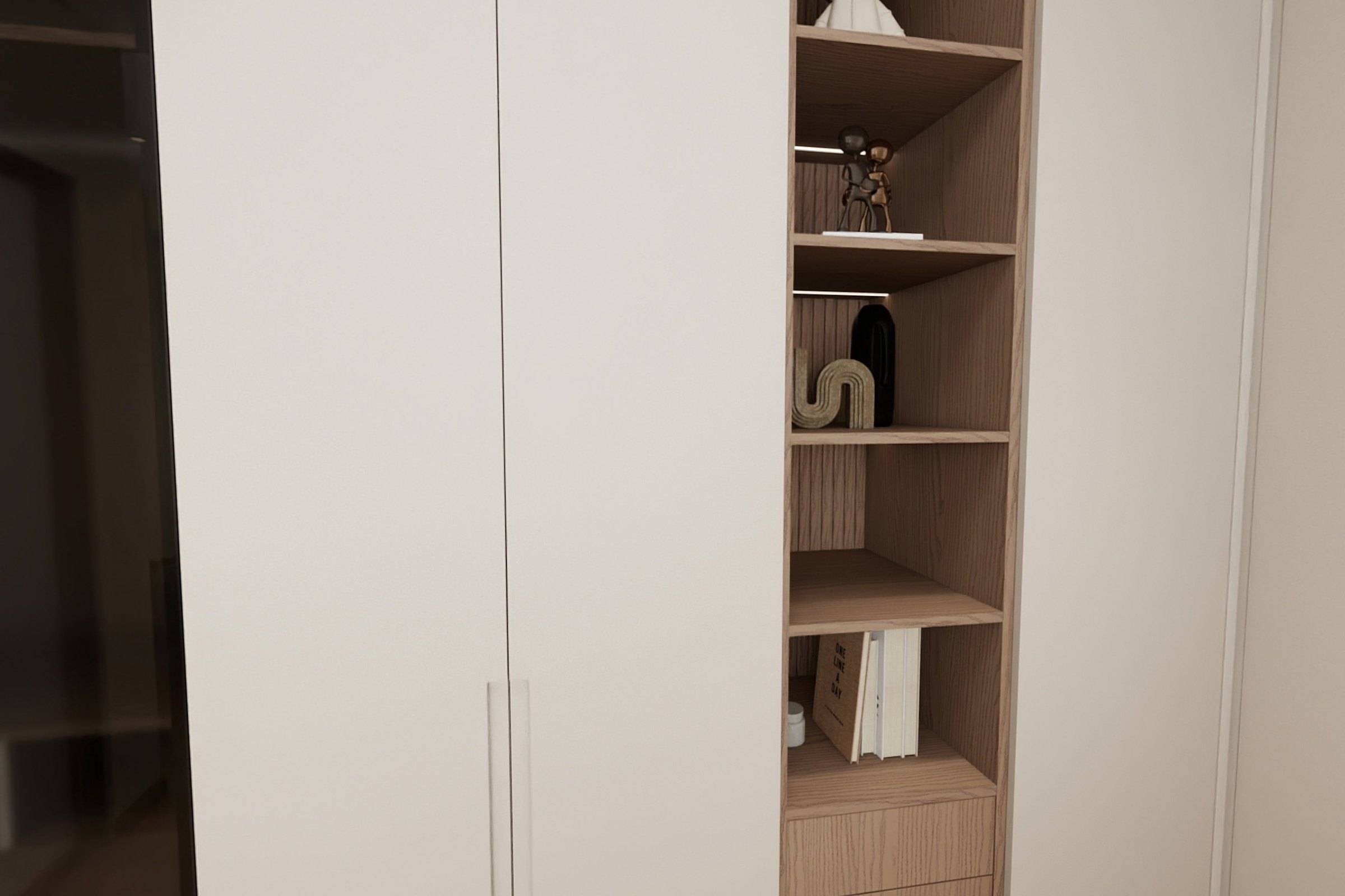 Built-in wardrobe with flush pale doors and a column of open timber shelving
