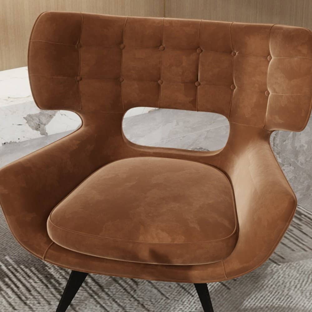 Close view of cognac leather upholstery with tufted detailing