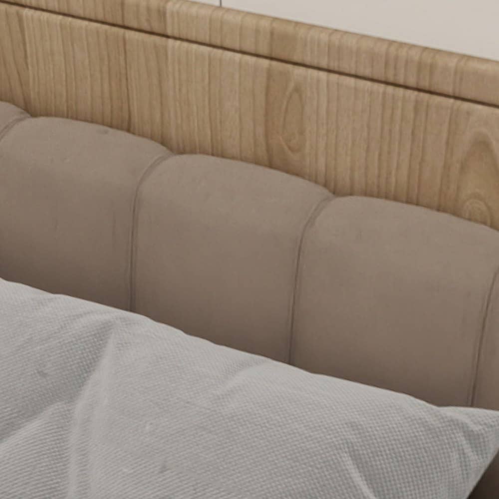 Close view of pale oak-tone timber wainscot meeting an upholstered headboard