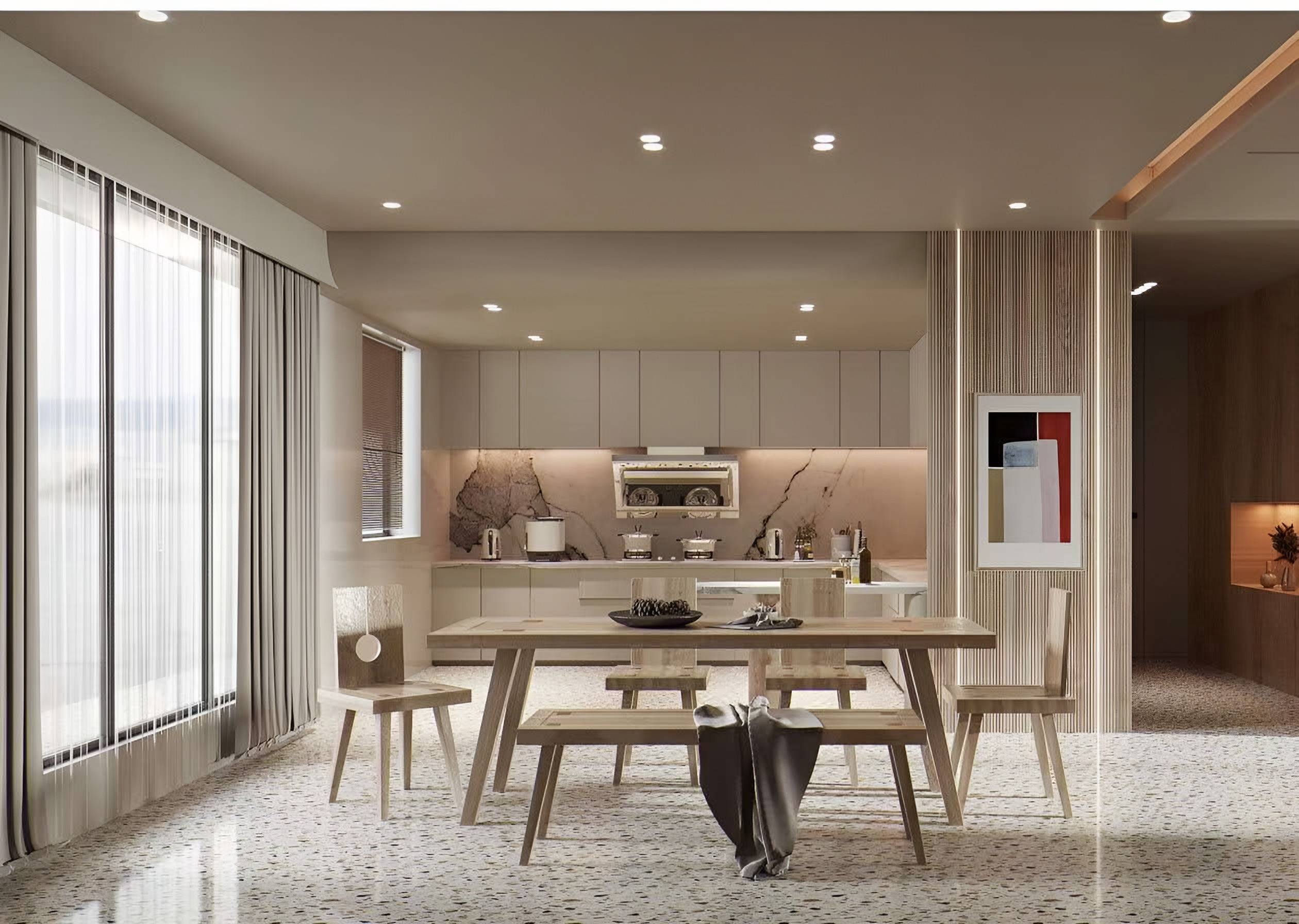 Kitchen and dining space with a pale timber table and benches, taupe flush cabinetry, a veined stone backsplash and terrazzo floor