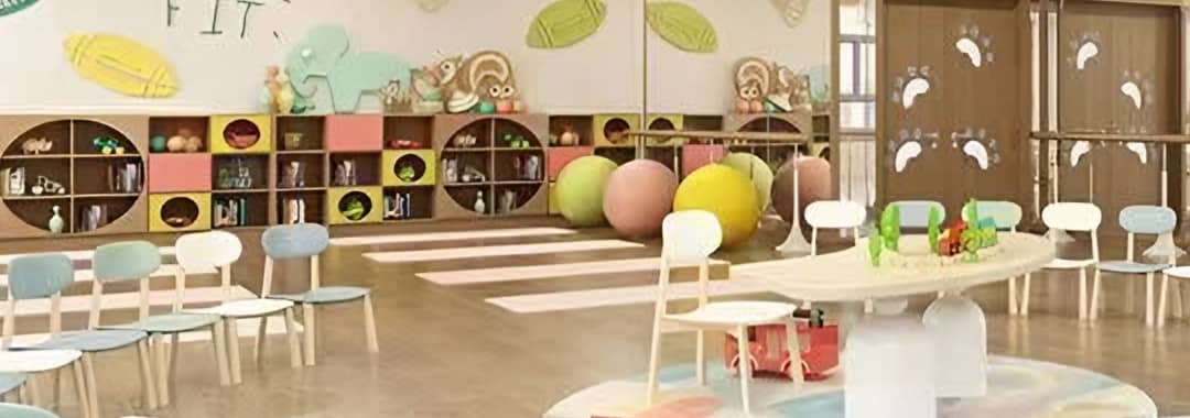 Low cubby storage in pastel colours along a children's activity hall