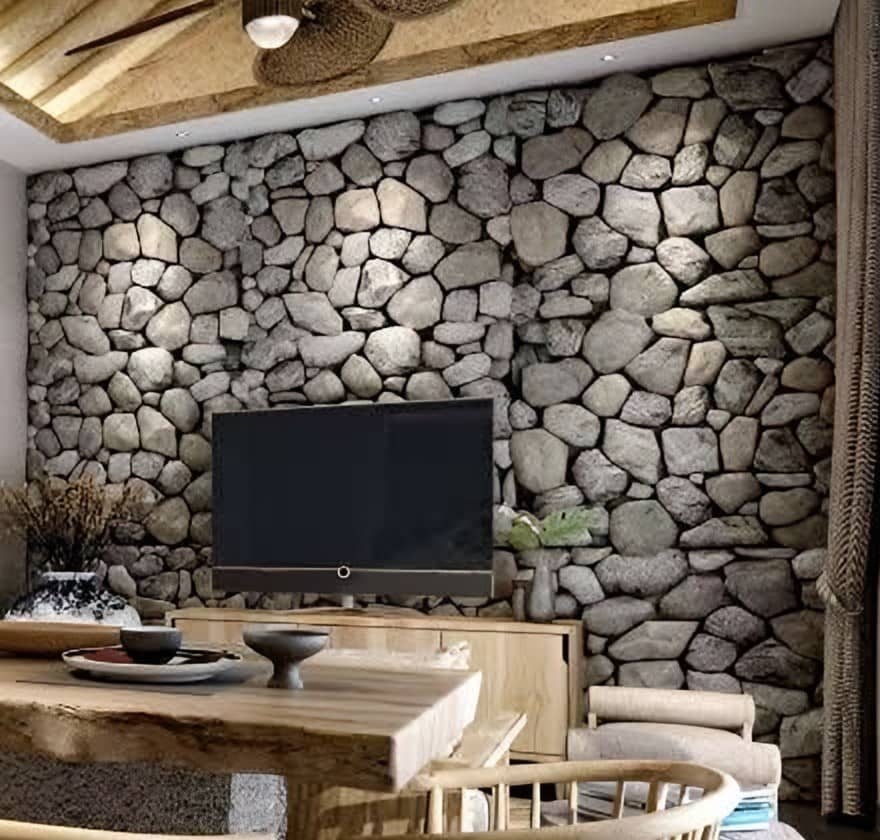 Detail of a dry-stone feature wall beside a timber sideboard