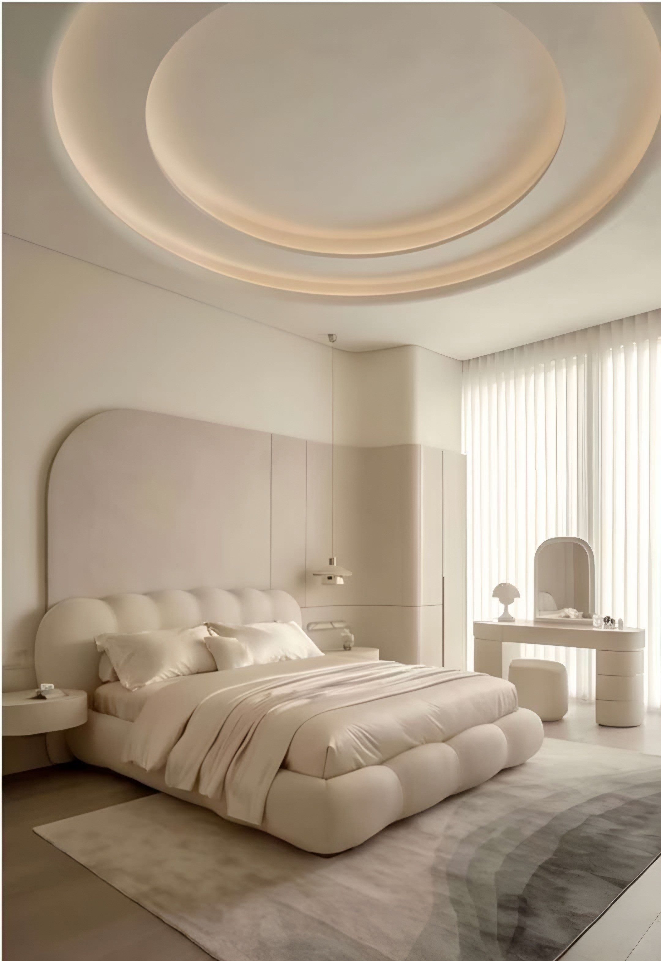 Salon with a curved sofa, a veined marble fireplace, framed mouldings and a sculptural pendant