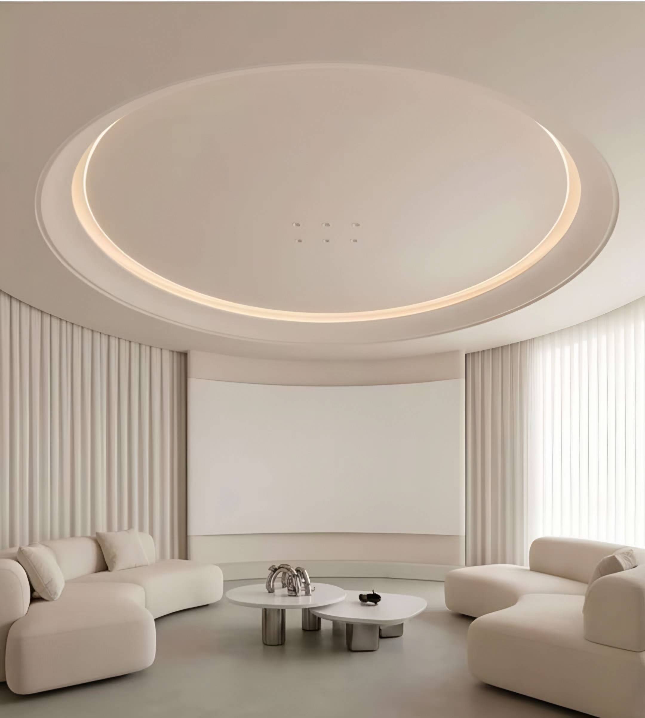 Circular lounge with a cove-lit round ceiling, curved sofas and sheer curtains following the wall