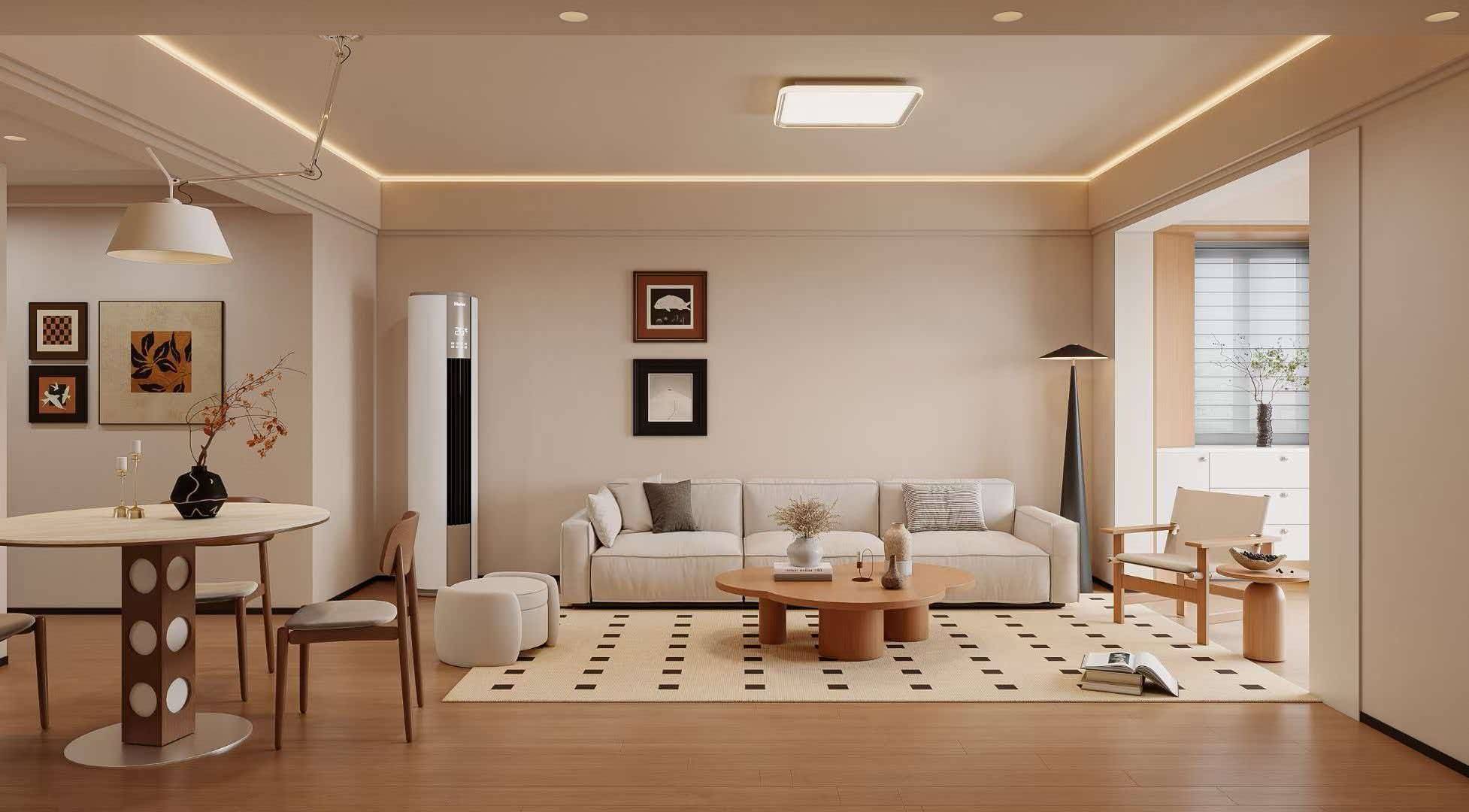 Warm living and dining room with a cream sofa, a cloud-shaped timber coffee table, a checked rug and a round dining table