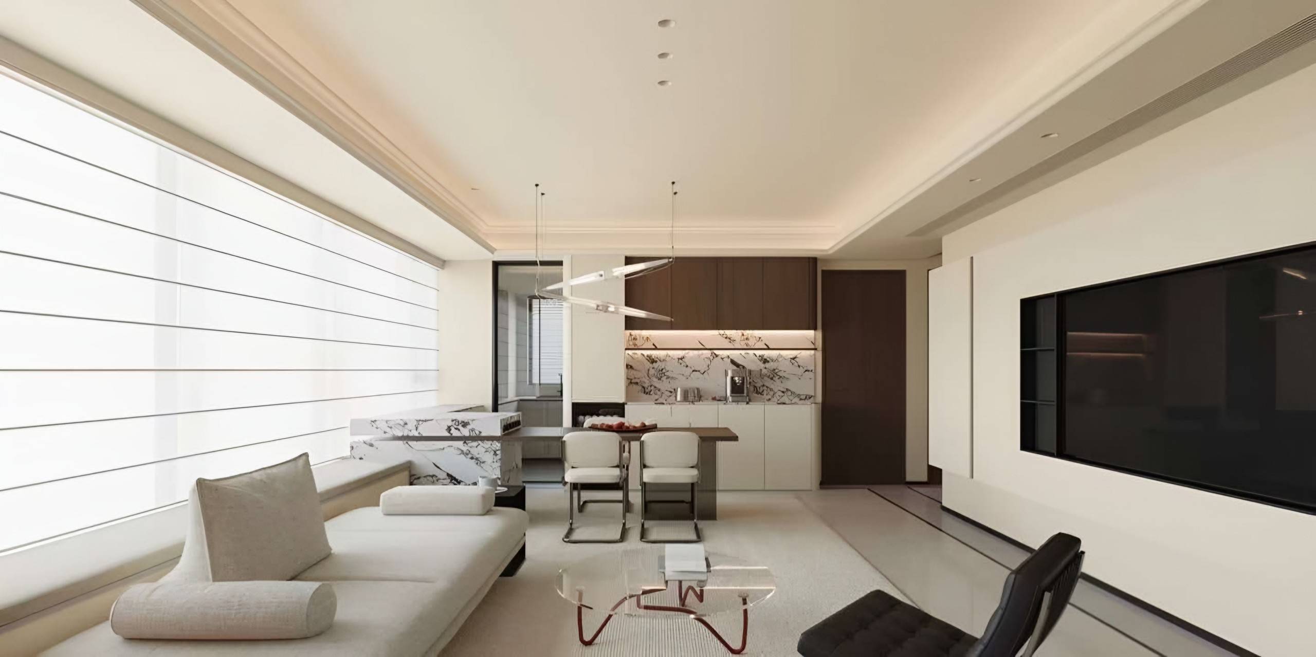 Long window with pleated blinds, a daybed sofa, a marble breakfast counter and dining table