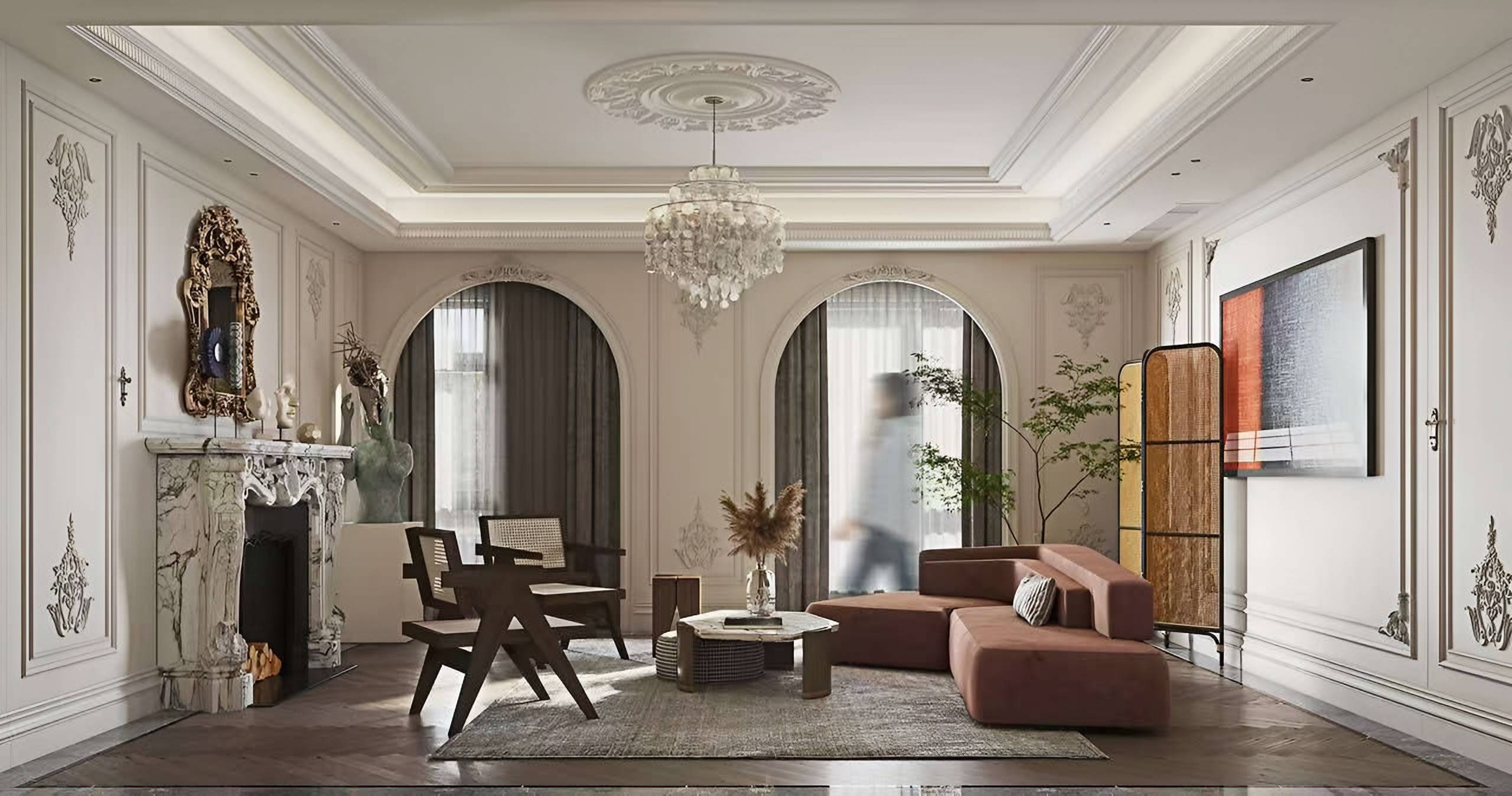 Classical living room with plaster mouldings, arched windows, a carved stone fireplace and contemporary seating