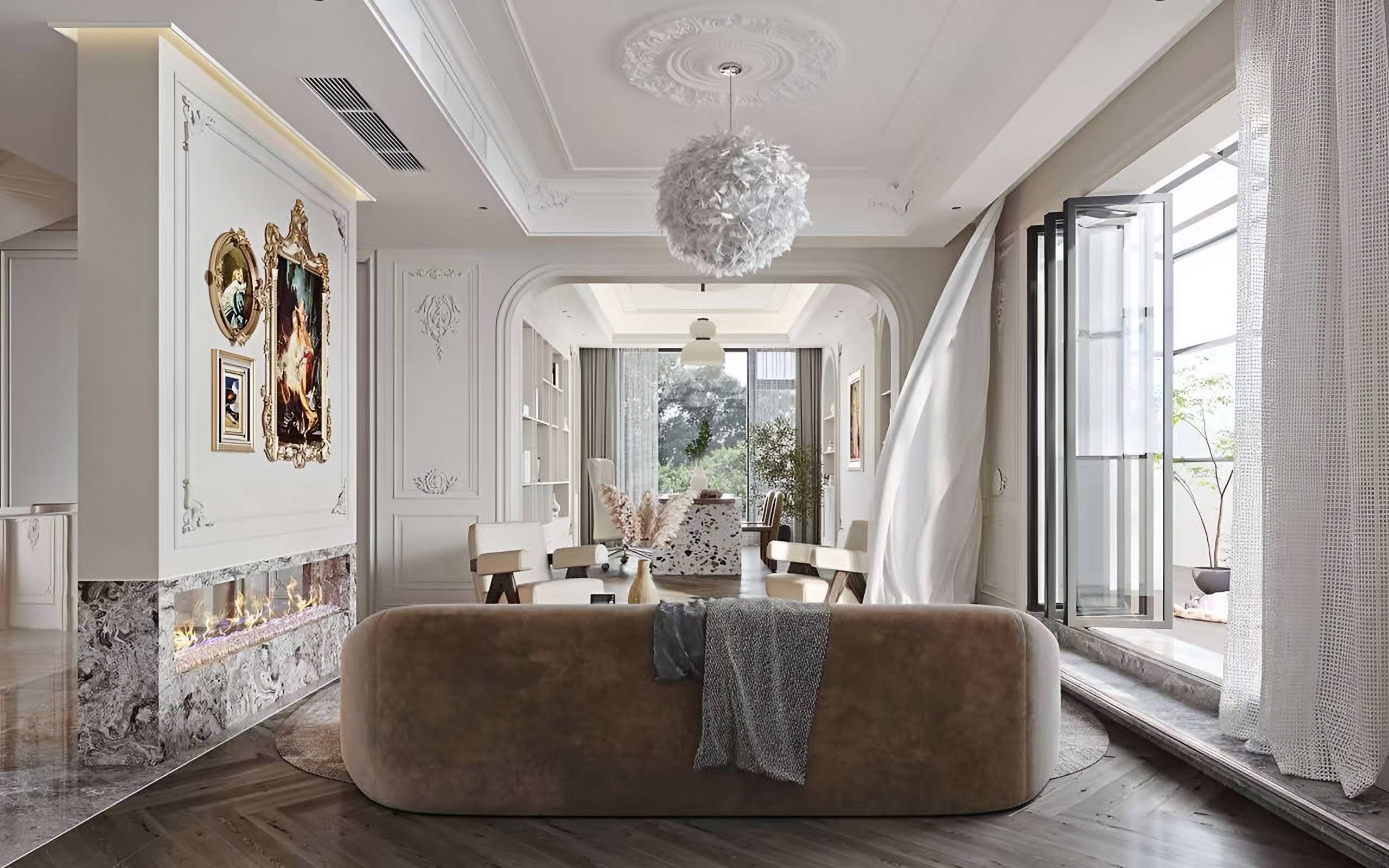 Salon with a curved sofa, a veined marble fireplace, framed mouldings and a sculptural pendant